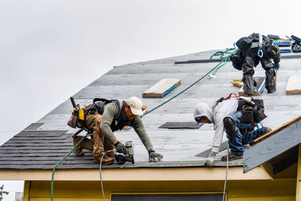 Professional Emergency Roof Repair technician working in Manchester, NY